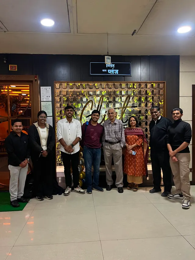 A group photograph taken outdoors after the event